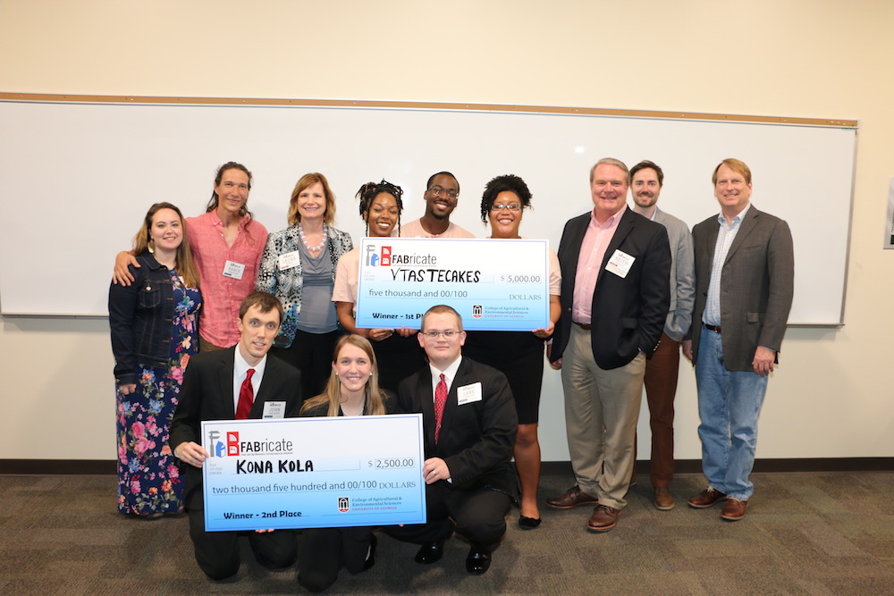 The UGA College of Agricultural and Environmental Sciences held its second annual FABricate entrepreneurship challenge, final pitch contest March 28 at Conner Hall. 
Wished Trees', from left, Mary Kate and Rance Paxton; first place winners VTasteCakes' Jasmyn Reddicks, Ayodele Dare and Tatyana Clark and second place winners Kona Kola's John Tarleton, Alyssa Flanders and Lane Flanders pose with judges and supporters, from left, Laura Katz, Keith Kelly, Jim Flannery and Bob Pickney.