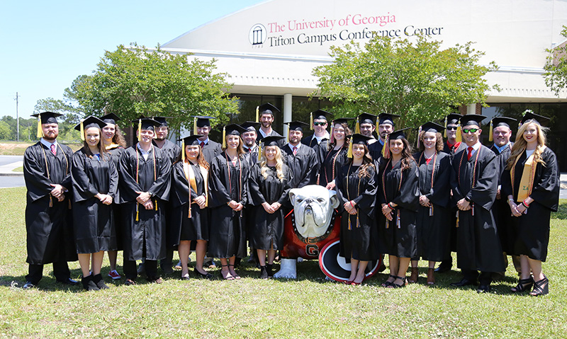 Members of the UGA-Tifton 2018 spring and summer graduation classes pose for a picture outside the UGA Tifton Campus Conference Center on April 29, 2018.