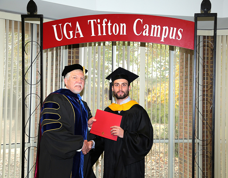 Stefano Gobbo is pictured with UGA-Tifton Assistant Dean Joe West during a graduation celebration held on the UGA Tifton campus on Saturday, Dec. 8, 2018. Gobbo is the first University of Padova student to earn a dual master's degree at UGA.