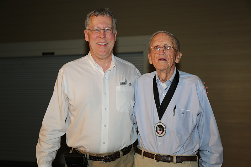 CAES Dean Sam Pardue, left, presented Frank McGill with the Medallion of Honor during special event on Thursday, May 2, on the UGA Tifton campus.