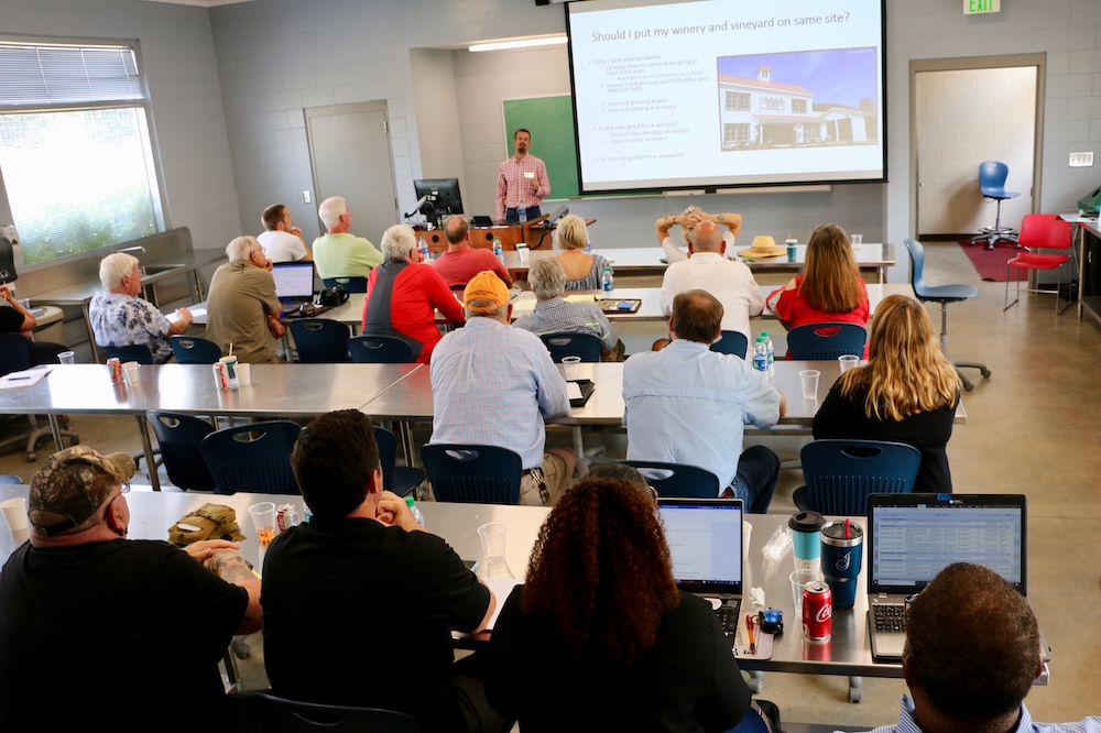 University of Georgia Cooperative Extension viticulture specialist goes over the basics of starting a muscadine vineyard at a muscadine workshop in Athens on July 9, 2019.