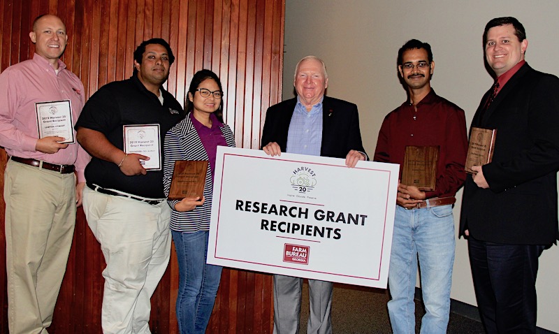 Georgia Farm Bureau President Gerald Long (center) announced the recipients of the GFB Harvest 20 Research Grants at the GFB Commodity Conference on Aug. 8. University of Georgia faculty who were awarded grants are (l-r) Lawton Stewart, Govindaraj Dev Kumar, Angelita Acebes, Sudeep Bag, Jonathan Oliver and (not pictured) Bhabesh Dutta and Mark Freeman.