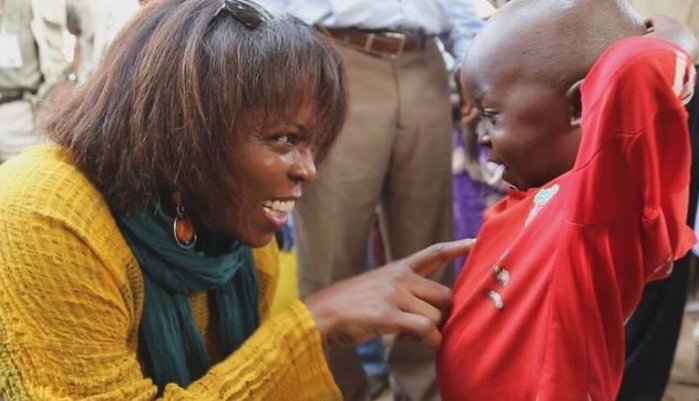 The former executive director of the United Nations World Food Programme, Ertharin Cousin, talks to a boy in the Central African Republic during her visit in late March 2014. Photo by World Food Prize. Not for reuse.