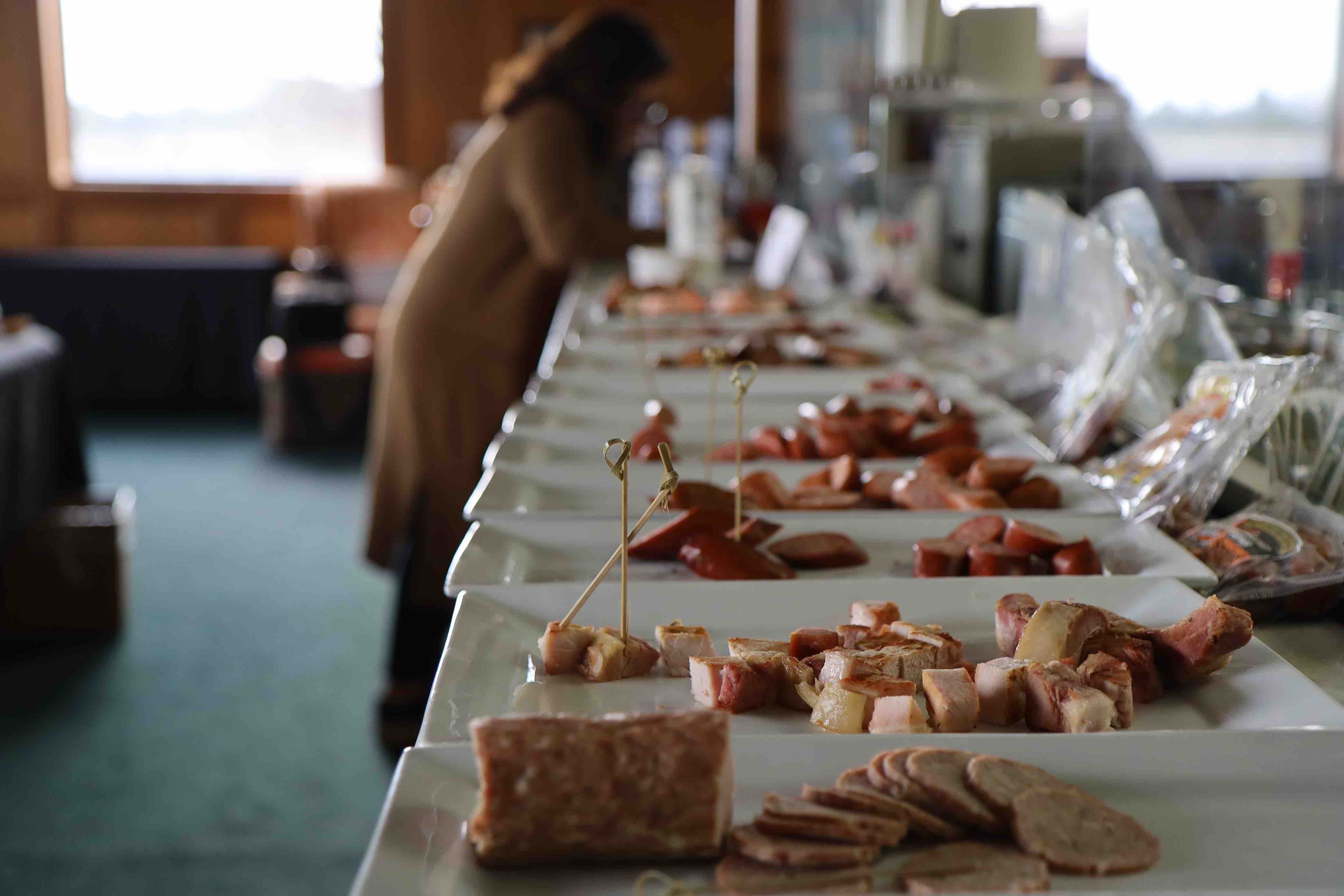 Meat and seafood products are prepared for judges to sample during the first round UGA’s Flavor of Georgia Food Product Contest.
