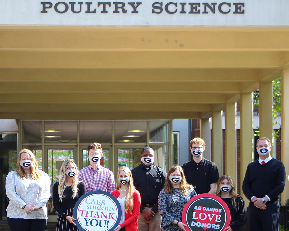 Joined by departmental student ambassadors, Todd Applegate (far right), UGA poultry science department head, sends a thank you to donors for supporting the university’s Department of Poultry Science.