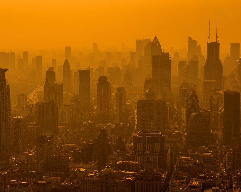 The Shanghai skyline is often clouded with smog from industrial air pollution.