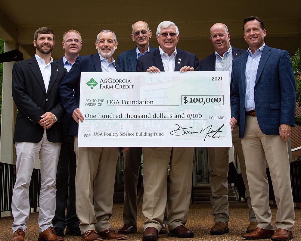 From left, AgGeorgia chief marketing officer Corey Cottle, poultry science department head Todd Applegate, CAES Dean Nick Place, AgGeorgia board member Bobby Miller, AgGeorgia board Chairman Dave Neff, AgGeorgia board Vice-chairman Jack Bentley and AgGeorgia CEO Rob Crain celebrate the lender's six-figure gift to the UGA Poultry Science Building Campaign.