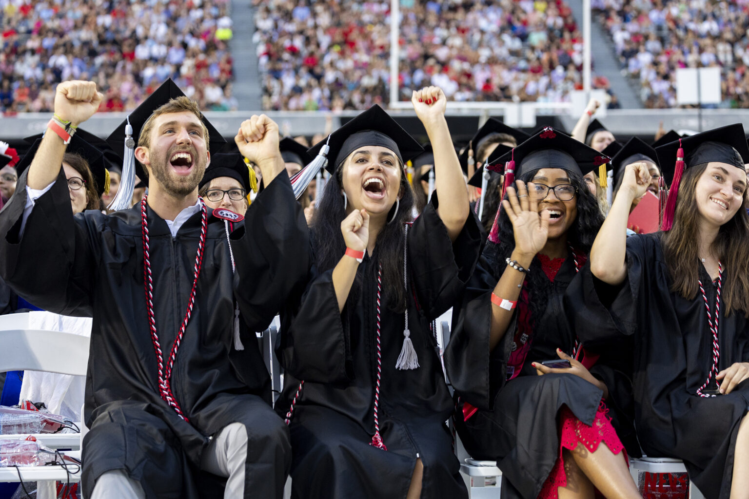 Graduating students celebrate during the Commencement Ceremony at Sanford Stadium. (Photo by Dorothy Kozlowski/UGA)
