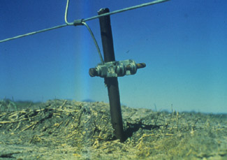 Photo of a driven 
 ground rod for grounding an electric fence.