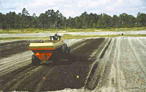 manure spreader applying compost