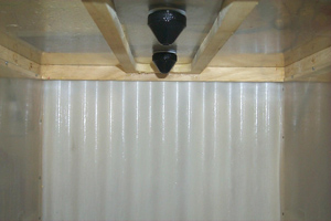 Electrostatic nozzles on the top of a chamber