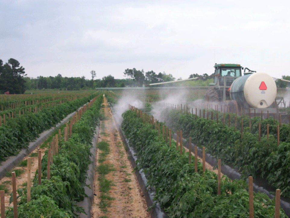 Hydraulic boom sprayer.