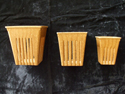 Figure 2. Some alternative containers are made from wood fiber, recycled paper or cardboard. (Photo: James H. Aldrich)