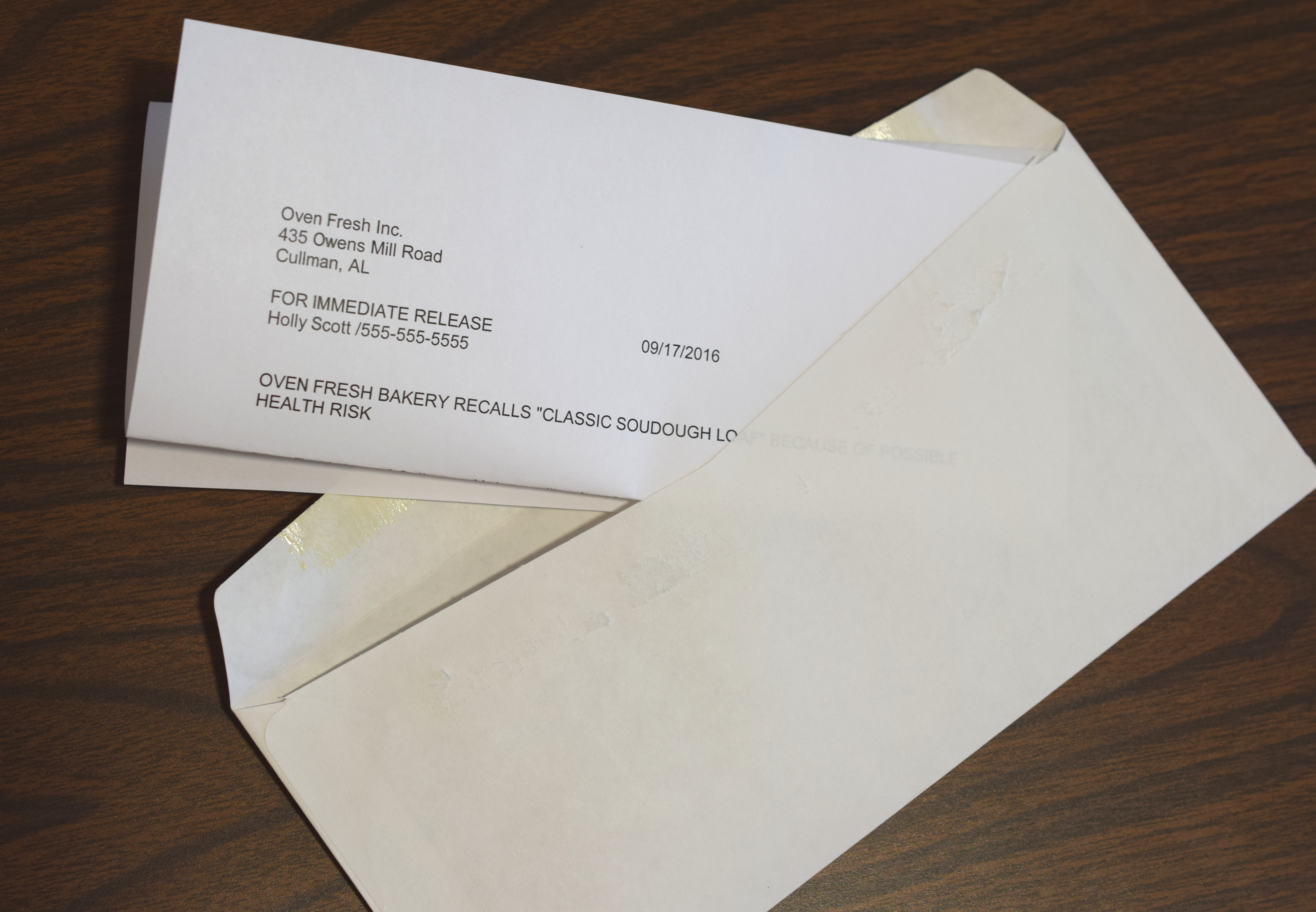 Envelope with a sample recall letter in it with contact information for the company issuing the recall and the product being recalled