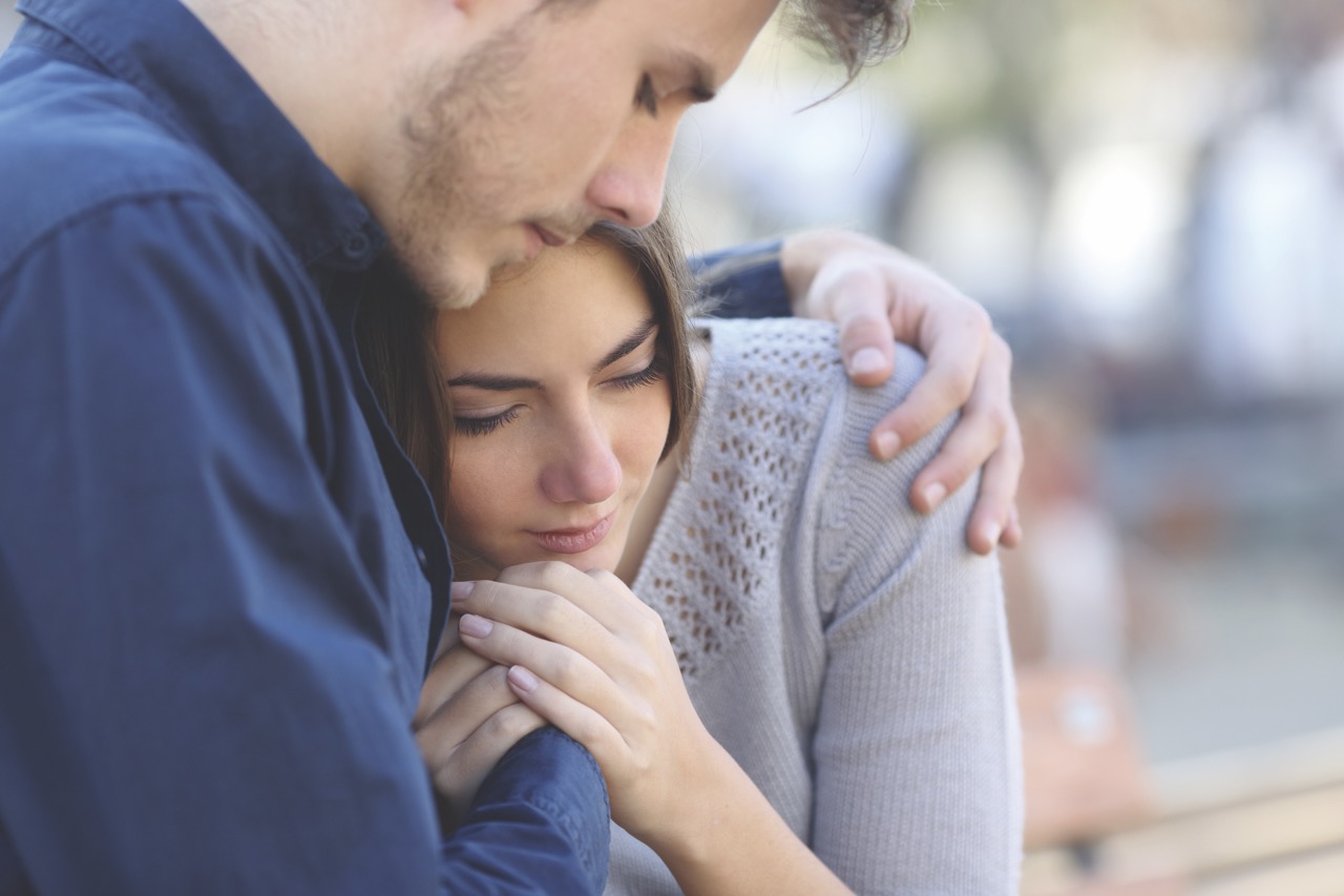 Man and woman hugging