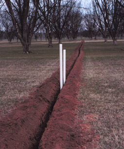 Figure 4. Installing PVC mainline.