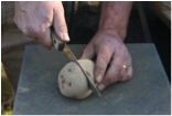 cutting a potato