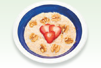 Oatmeal with strawberries and nuts on top