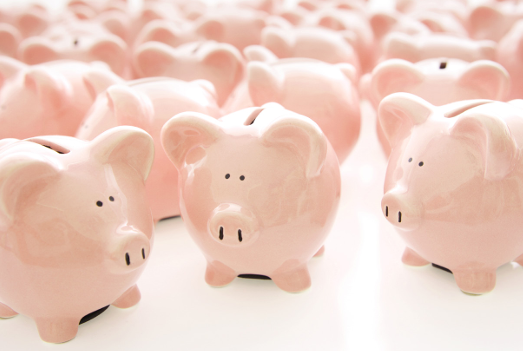 Pink piggy banks lined up