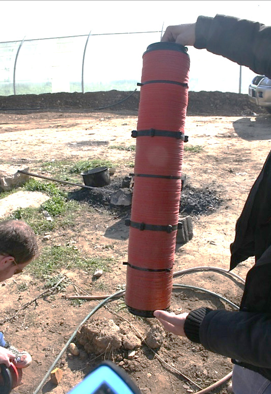 Person holding a disk filter