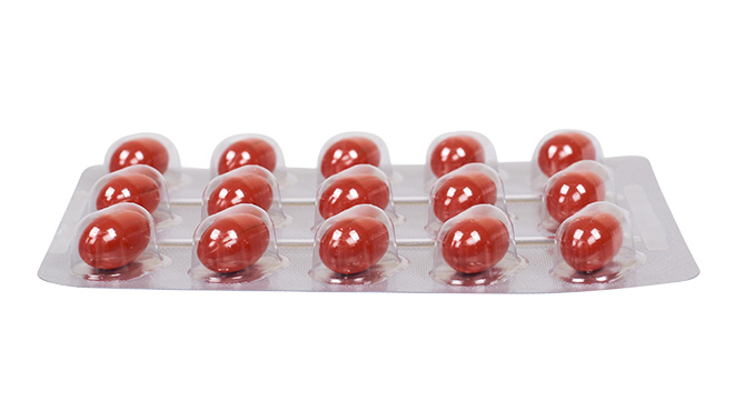 round red cold/sinus tablets in foil packets