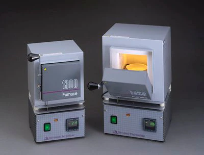 Two models of lab-quality muffle furnace used in total solids testing