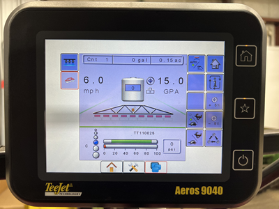 In-cab display screen showing sprayer settings