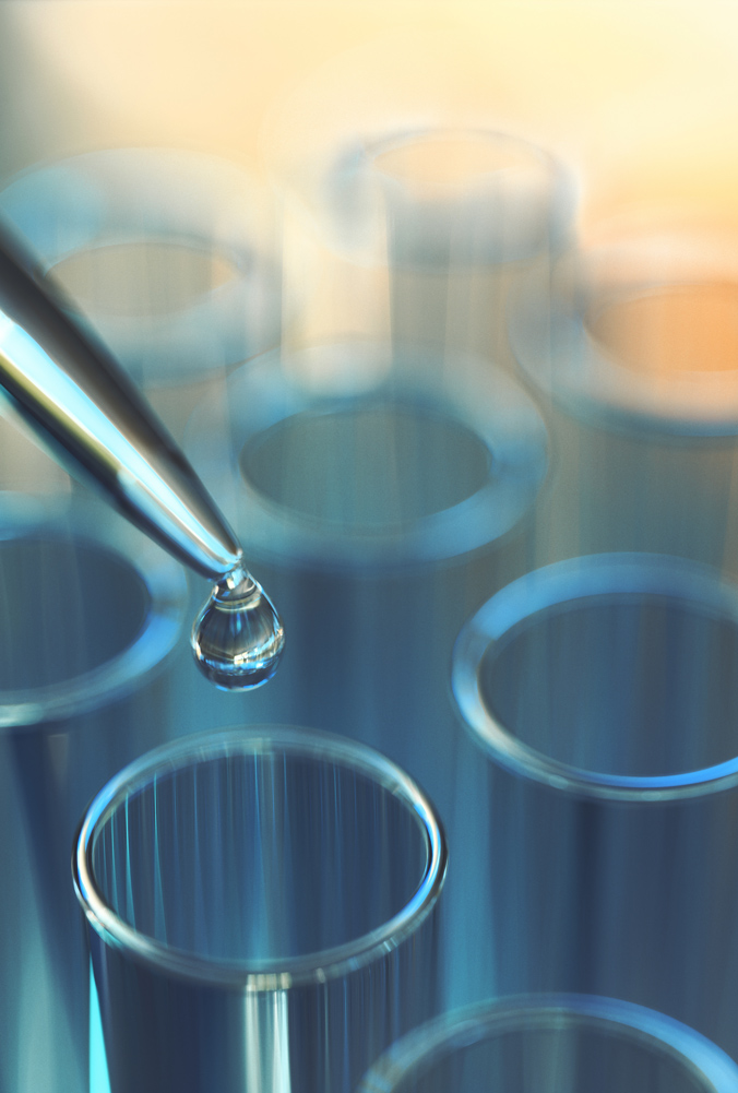 water from an eye dropper is going into a test tube