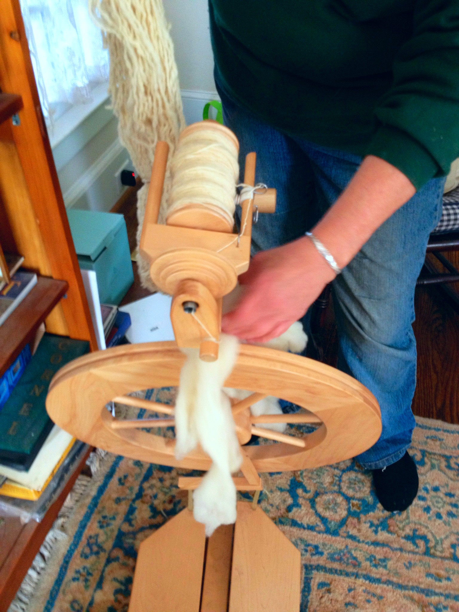 Madison County sheep farmer Jan Southers spins wool from her sheep into yarn.