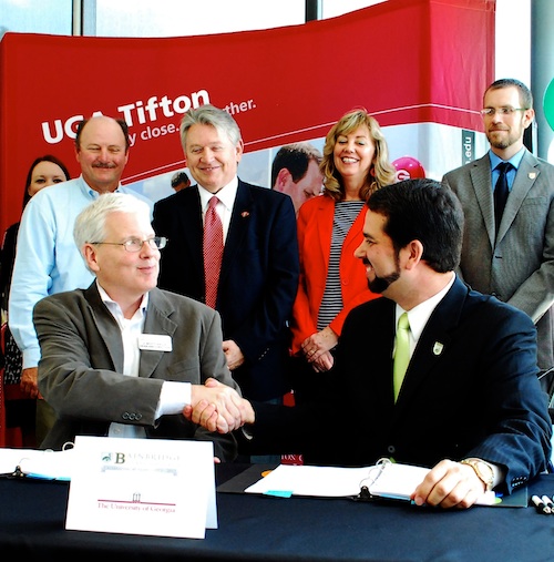 Officials from the University of Georgia College of Agricultural and Environmental Sciences and Bainbridge State University sign Memorandums of Understanding that will allow students who graduate from BSC to automatically gain acceptance into a bachelor's degree program in agriculture at the UGA campus in Tifton.