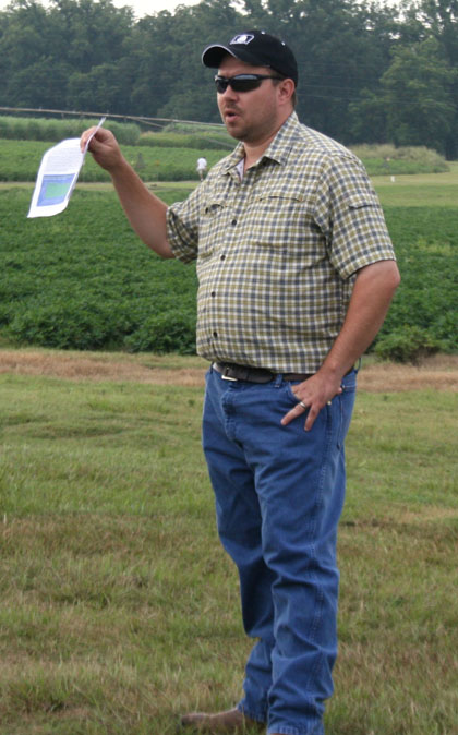 Guy Collins, an Extension cotton agronomist with the University of Georgia-Tifton campus, talks about cotton to producers and consultants at the Southeast Georgia Research and Education Center Field Day in Midville on Aug. 14.