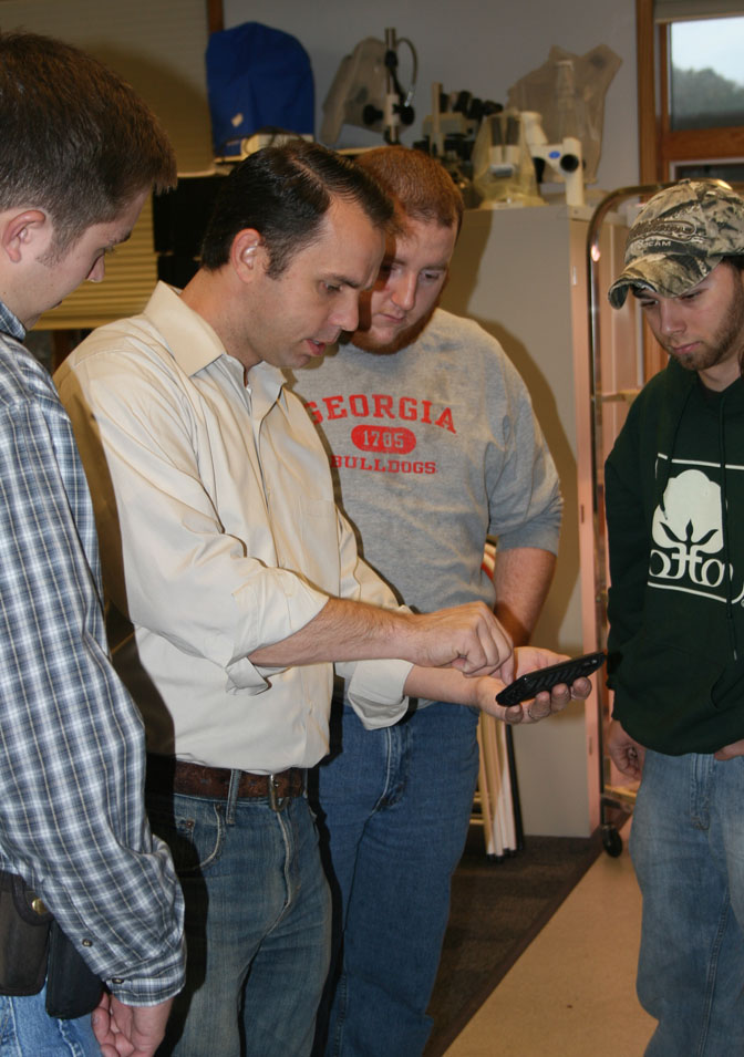 Jason Peake, associate professor at the UGA Tifton Campus, talks with his students in a class during last spring semester.