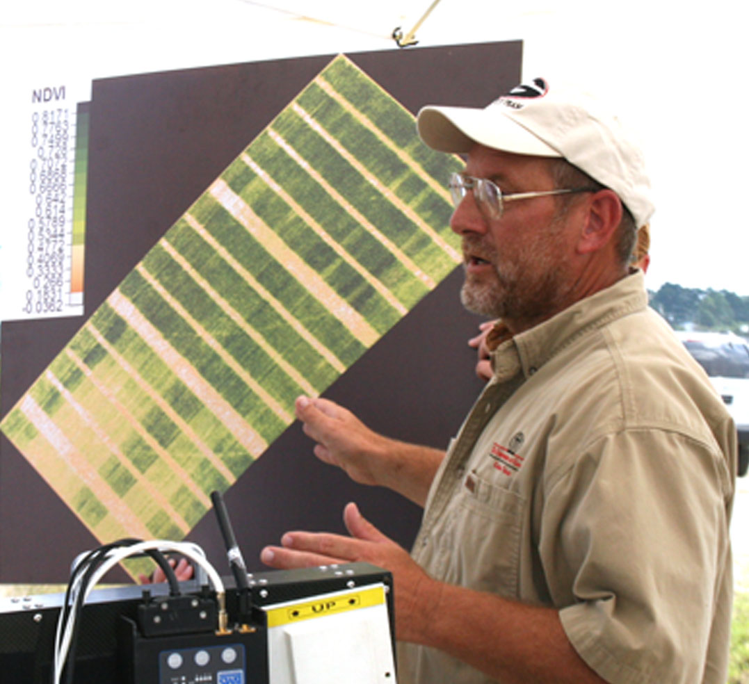 Glen Harris, a Cooperative Extension agronomist with the University of Georgia, talks about the potential impact that unmanned aerial vehicles could have on cotton production during a demonstration of the system at the Sunbelt Expo in Moultrie.