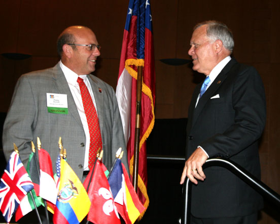 Zippy Duvall, president of the Georgia Farm Bureau, left, talks with Georgia Gov. Nathan Deal at the International Agribusiness Conference and Expo in Savannah on Sept. 25.