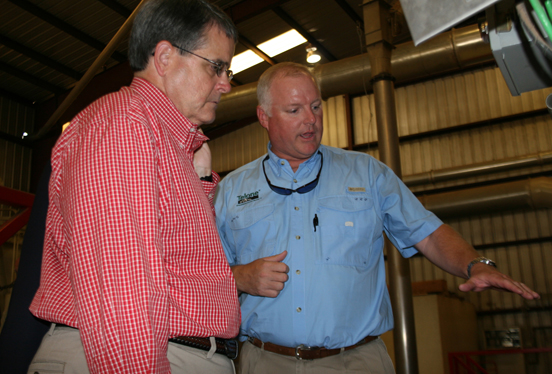 UGA President Jere Morehead meets with Ben Evans, manager of Coffee County Cotton Gin in Douglas on Wednesday, Sept. 3, 2014.