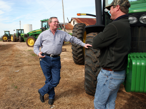 Paul Wigley, a University of Georgia Cooperative Extension coordinator in Calhoun County, talks to farmer Drew Collins on Jan. 28, 2010 in Morgan, Ga.