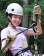 Georgia 4-H plans several camps throughout the year especially for military youth. A military youth camper is shown practicing rock climbing at Camp Wahsega near Dahlonega, Georgia.
