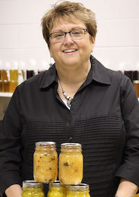 Elizabeth Andress, director of the National Center for Home Food Preservation housed in the University of Georgia College of Family and Consumer Sciences, trains UGA Cooperative Extension agents and others on the proper, safe way to can fruits, vegetables and other foods.