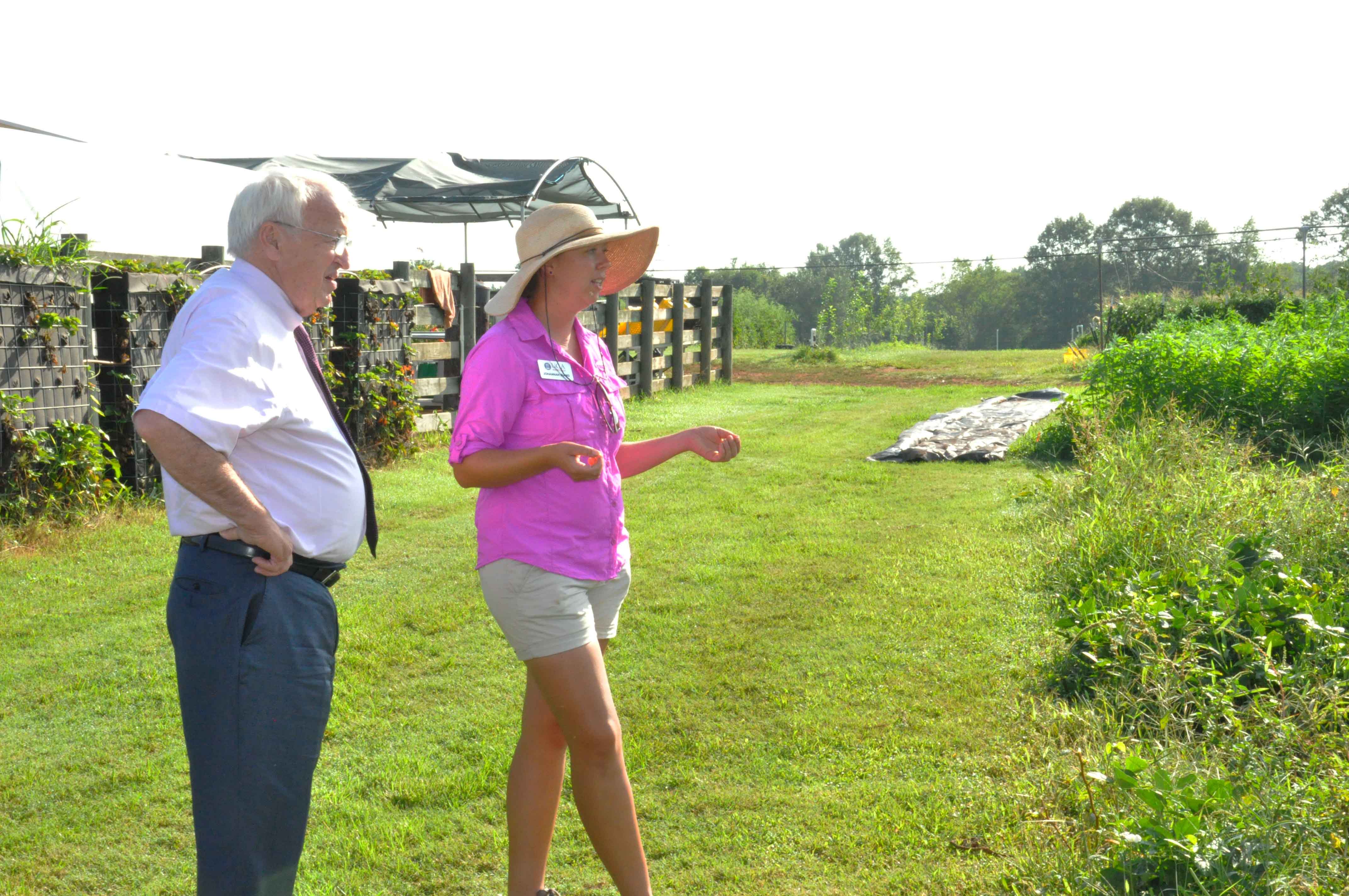 UGArden Manager JoHannah Biang gives a tour to USDA undersecretary Kevin Concannon during his tour of Athens on July 22, 2015.