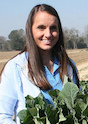 Teila and Walter Driggers gather collard greens on their farm in Collins, Georgia. As a farm wife, Teila helps her husband grow and sell their crops. An up-coming workshop for farm women is designed for for women just like Teila.