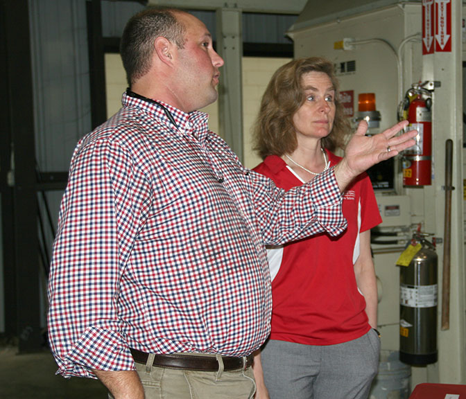 UGA Extension cotton agronomist Jared Whitaker speaks with Pamela Whitten, UGA provost, about cotton and its importance to Georgia during Whitten's visit on Thursday, March 17.