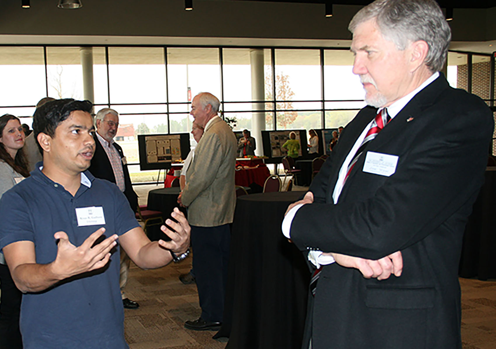 UGA graduate student Kiran Gadhave speaks about his research with Joe West, assistant dean on the UGA Tifton Campus on March 17, 2016.