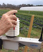 University of Georgia researchers are testing the use of temperature and leaf moisture monitors as a way to help farmers determine when to spray strawberries for diseases. The Strawberry Advisory System was developed by scientists at the University of Florida. The monitoring devices are shown being installed in a strawberry field in Baxley, Georgia.