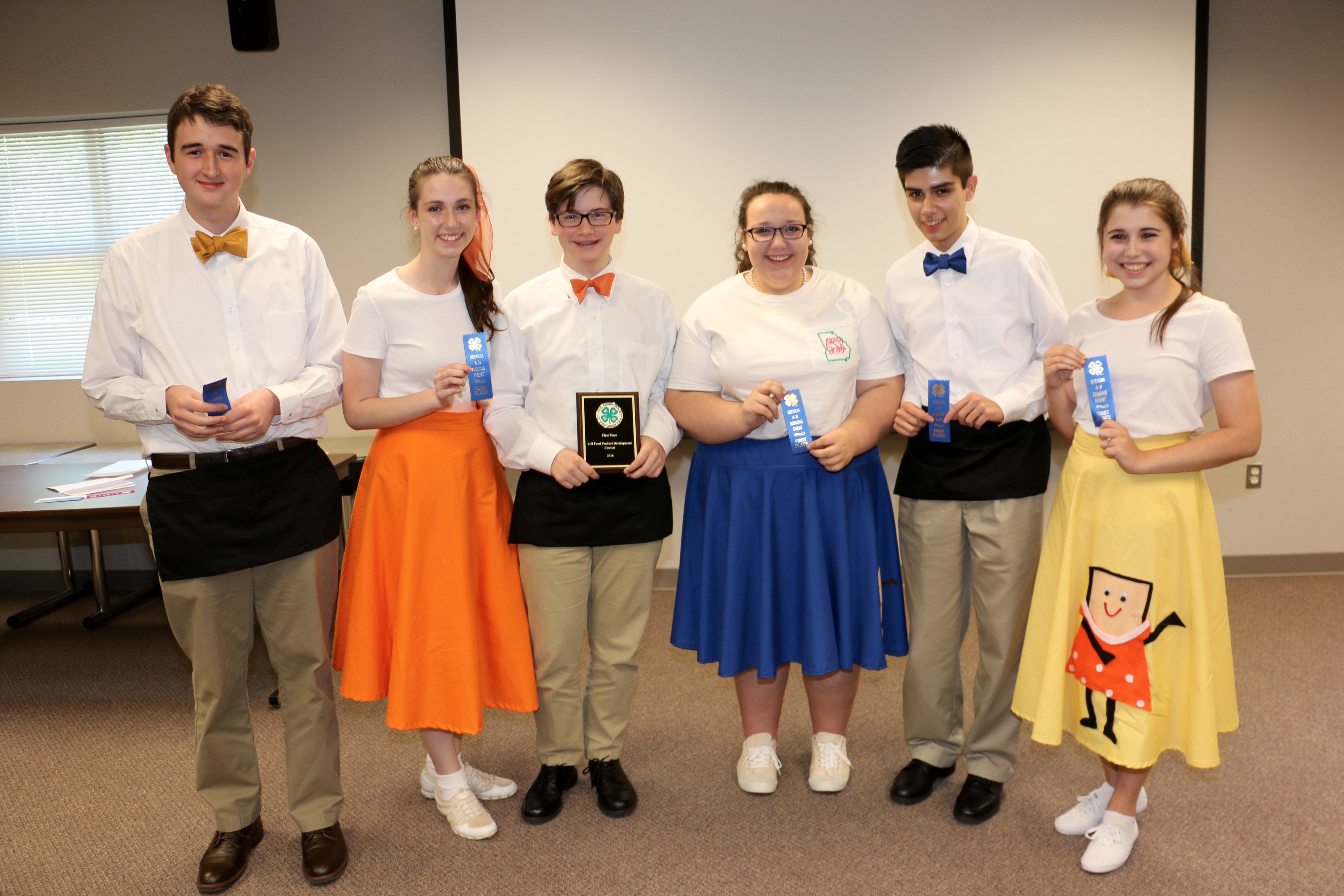 Members of the first place Spalding County 4-H Food Product Development Team include Hannah Rutledge, Isabel Rutledge, Carrianna Simmons, Nathaniel Haulk, Jordan Turner, Francisco Javier Zepeda and their coach, 4-H Program Assistant Lisa Kelley.