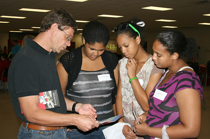 UGA Tifton's George Vellidis talks to students during the Southeast showCAES event in 2013.