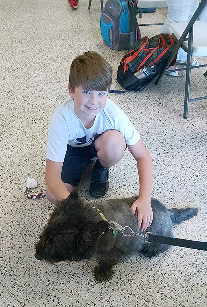 Lee County 4-H member Dylan Smith with Chipper the dog.
Photo submitted by Lee County 4-H.