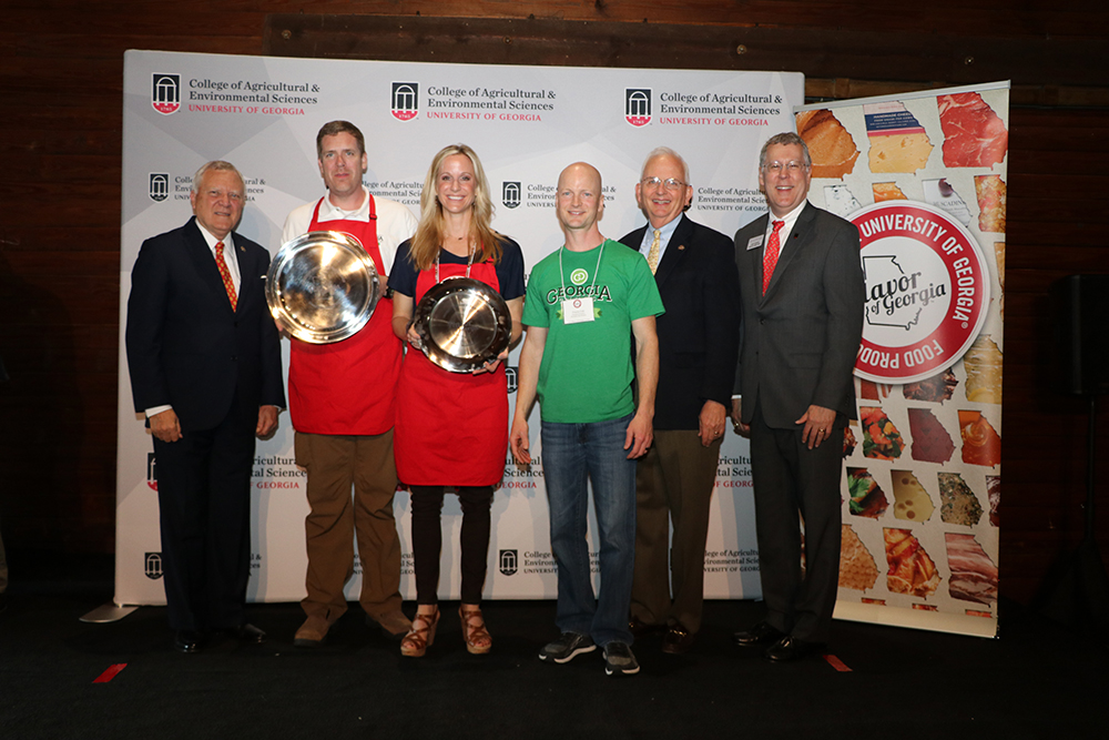 Governor Nathan Deal, from left, congratulates Harry and Jaime Foster and Travis Cole, of Georgia Grinders, who are accompanied by Georgia Agriculture Commissioner Gary Black and College of Agricultural and Environmental Sciences Dean and Director Sam Pardue. Georgia Grinder's Premium Nut Butters' Pecan Butter won the grand prize at the University of Georgia's Flavor of Georgia Food Product Contest.