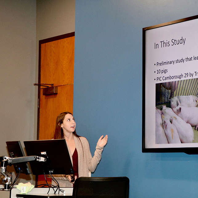 Sarah Kanter, a student studying animal science at the UGA College of Agricultural and Environmental Sciences, presents her research on gait changes in swine at the 2017 CAES Undergraduate Research Symposium on April 12.