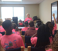 Debra Cox, Mitchell County 4-H program assistant, speaks to a group of 4-H students at the 4-H20 camp on Wednesday, June 14, 2017.