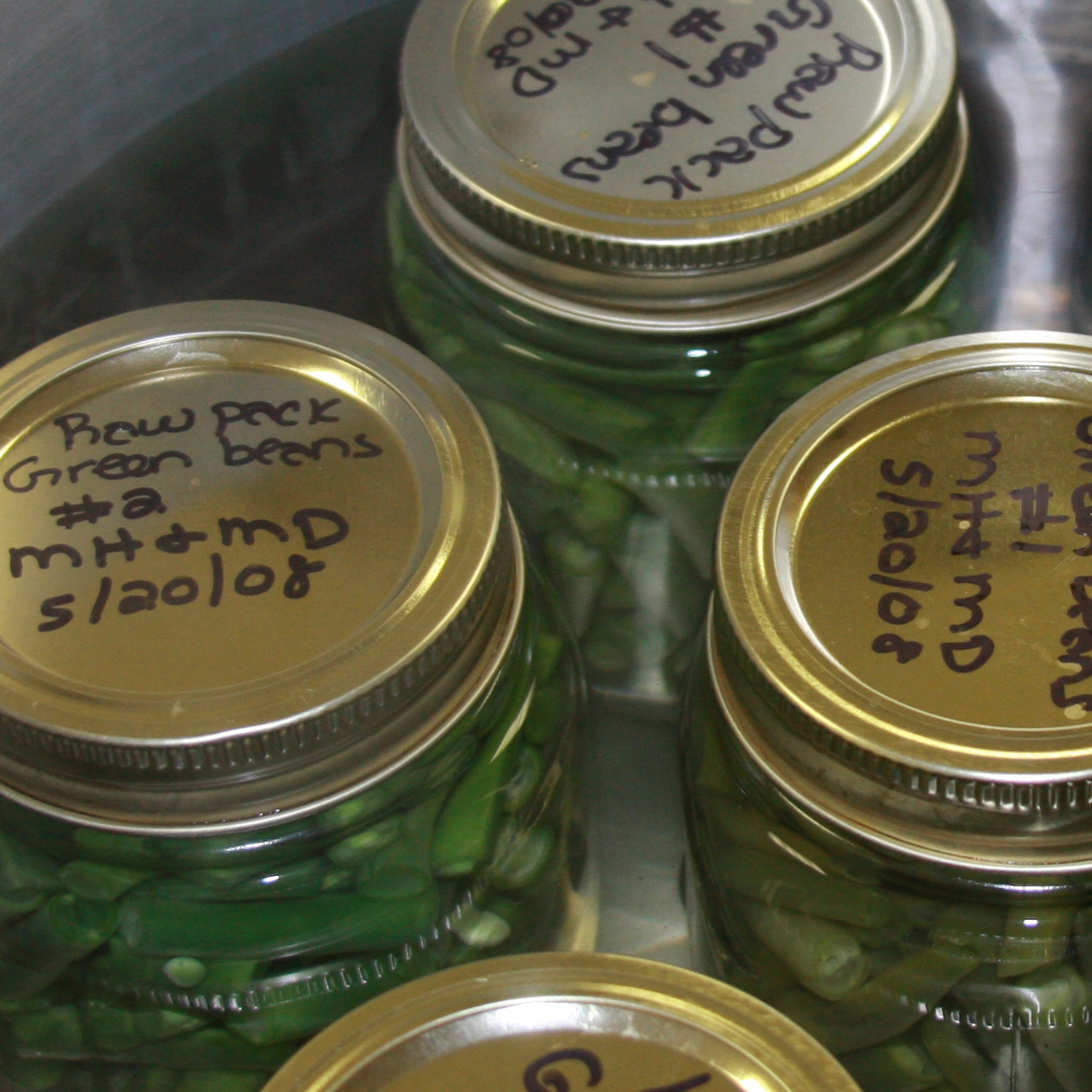 Canning beans in a pressure canner. May 2008.